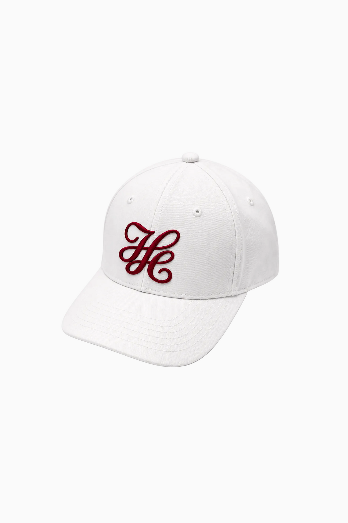 IH NOM UH NIT FW26 white cotton twill cap with embroidered monogram and curved visor 