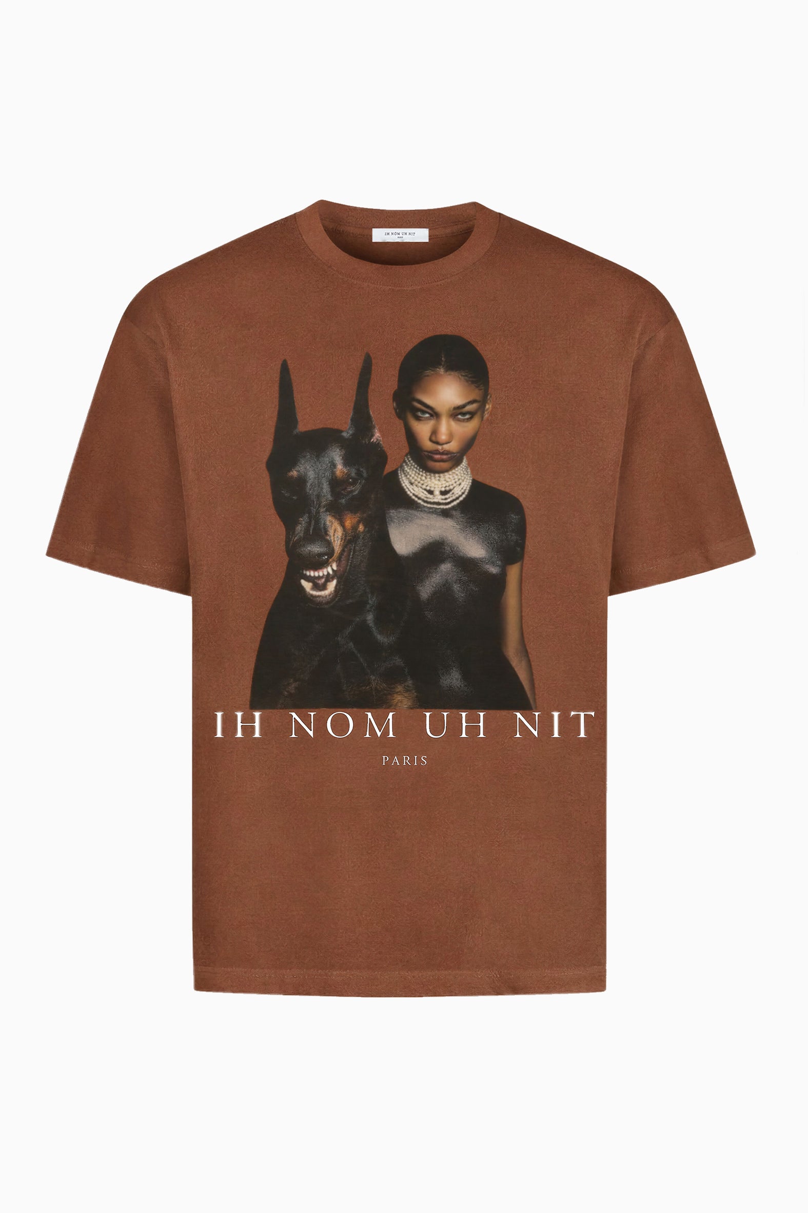 IH NOM UH NIT brown cotton T-shirt featuring the Family Print artwork with a Dobermann and editorial fashion portrait