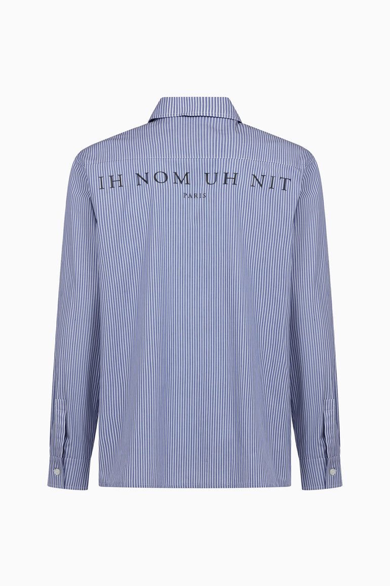 IH NOM UH NIT FW26 blue and white striped cotton shirt with IH NOM UH NIT PARIS logo across the upper back