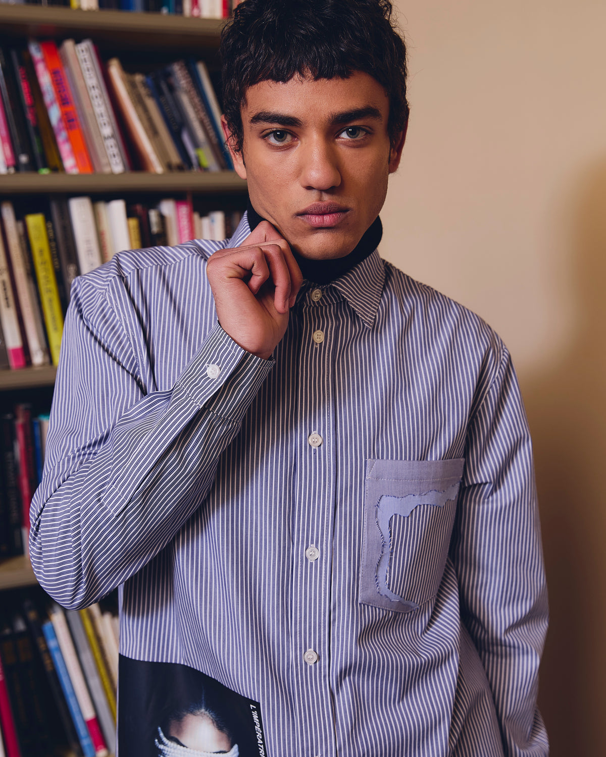 IH NOM UH NIT FW26 blue and white striped cotton shirt with L'Impératrice photographic artwork and contrast chest pocket, front view