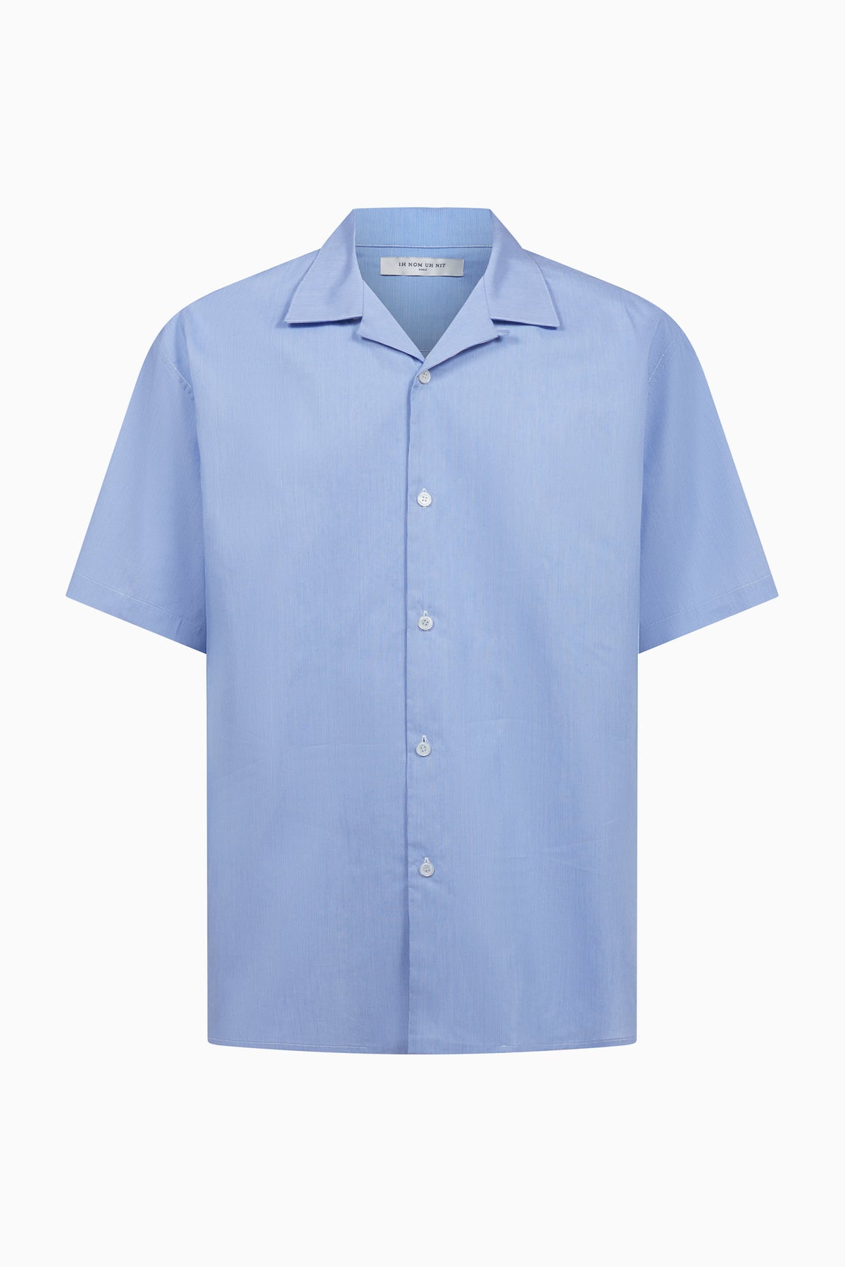 IH NOM UH NIT FW26 light blue cotton New Future Mask Bowling Shirt with open collar, front view