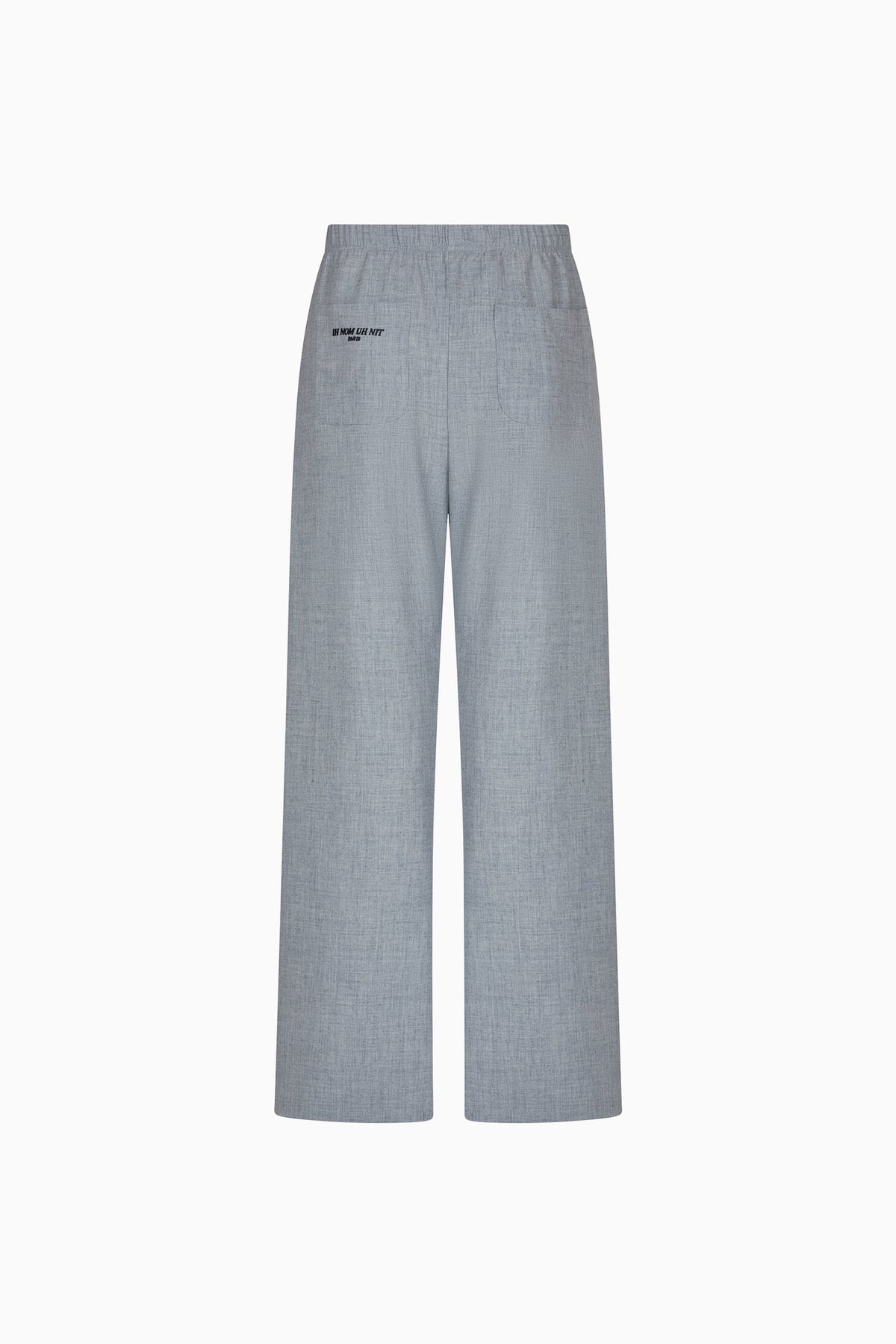 IH NOM UH NIT FW26 grey wide-leg flannel pants with rear patch pockets and small logo detail, back view